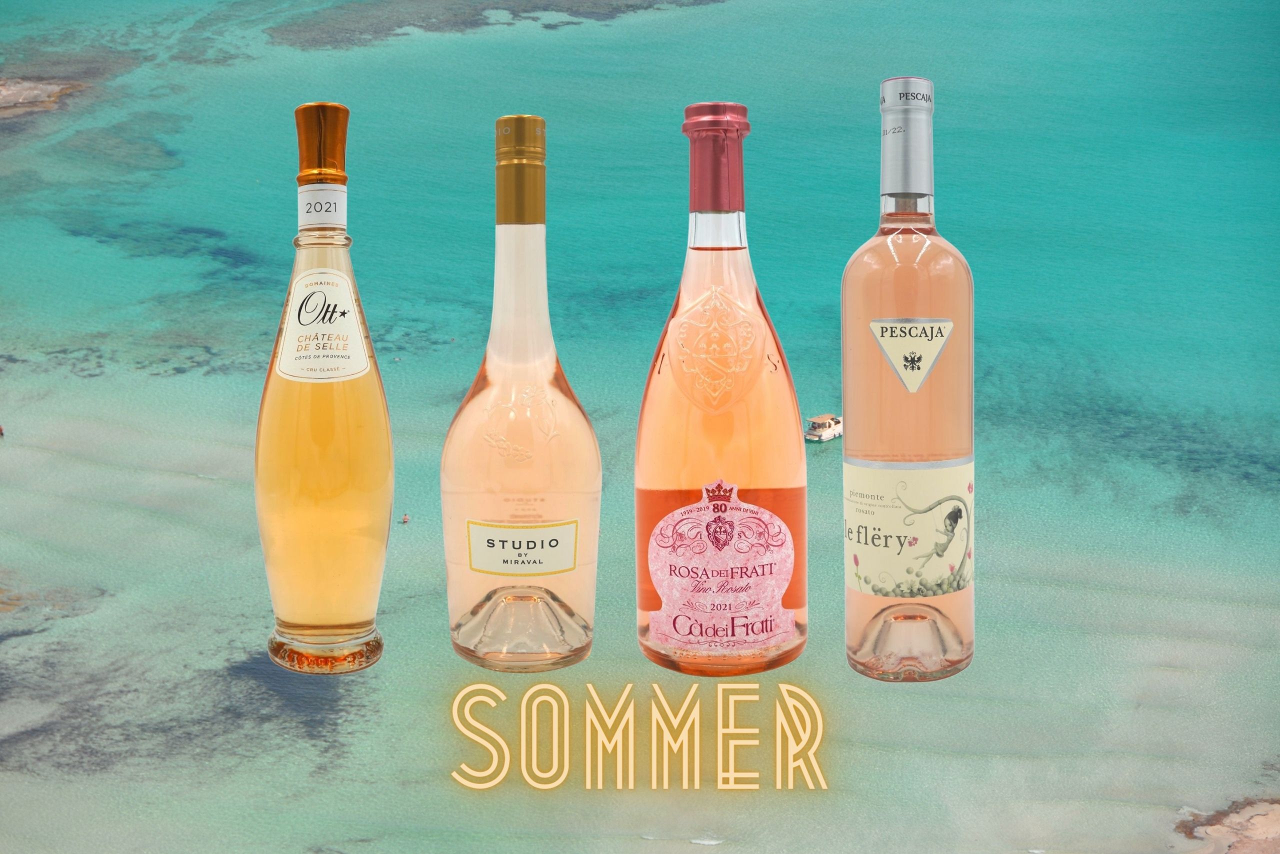 4 Flaschen Roséwein mit Meer  im Hintergrund